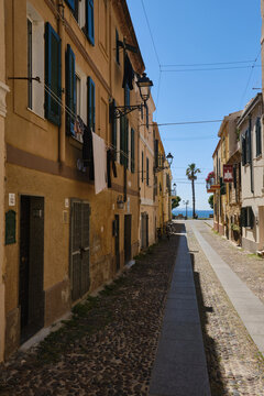 A cobbled street in the centre of Alghero, Sardinia, Italy