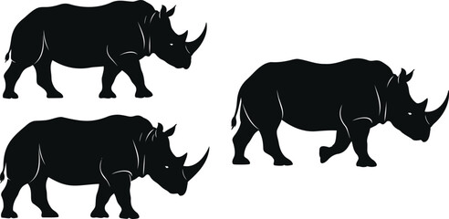 African Rhinoceros Black Silhouette Vector Set with Side View Poses for Safari Adventure Logos, Wildlife Conservation Badges, and Zoo Mascot Designs © Ashik 
