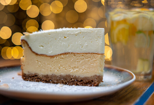 New York style baked cheesecake slice, served at Mazel Tov ruin bar restaurant in Budapest, Hungary.