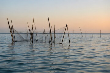 Pole setup with nets in ocean, ultra-realistic visual photography, no humans, pure visual style