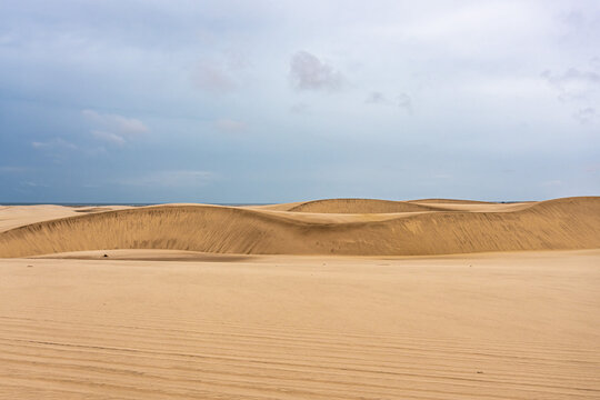 Dunes and lagoons of Atins, Lencois Maranhenses, Barreirinhas, Brazil. White sand dunes with pools of fresh water