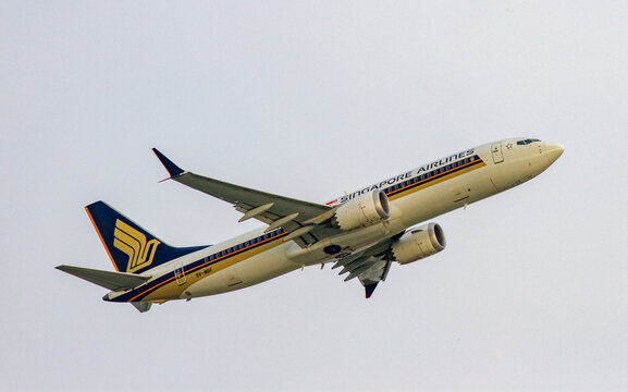 Changi, Singapore - &lrm;&lrm;&lrm;July 6, 2024 : A Boeing 737-8 MAX Airplane Of Singapore Airlines With Registration 9V-MBF Taking Off Changi Airport.