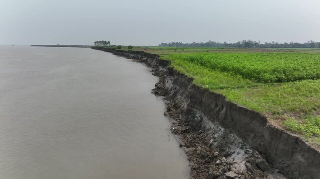 Riverbank erosion causing a landslide into the water