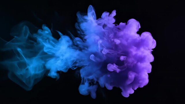 Vibrant ink cloud blooming in dark water with glowing neon light and cinematic motion