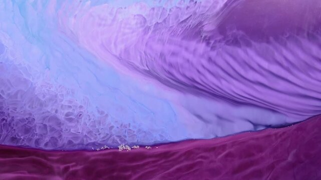 Alcohol ink art showing abstract design with flowing colors and patterns in a creative space
