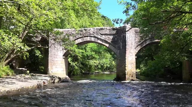 New Bridge on Dartmoor, a medieval bridge built in 1413. Over the River Dart.