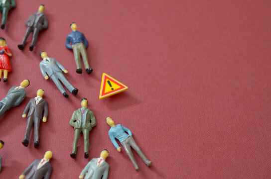 Toxic Person and Red Flags in Corporate Culture Concept with Warning Sign and Miniature Figurines
