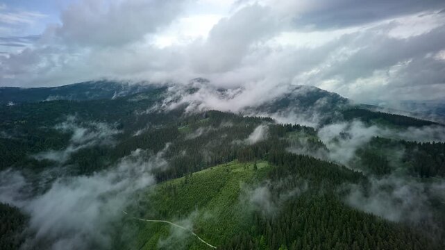 Aerial Hyperlapse Forward Flight Over Misty Mountain Forest After Rain