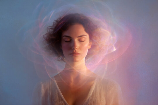 Meditative woman with luminous swirling aura layers around her head for mindfulness background and spiritual banner design