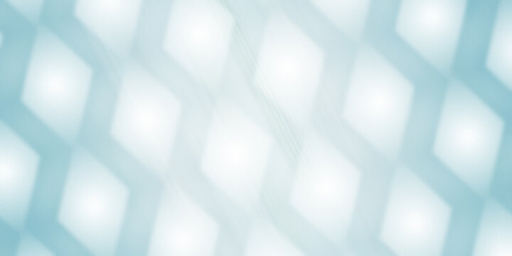 Soft abstract background with glowing white squares on light blue