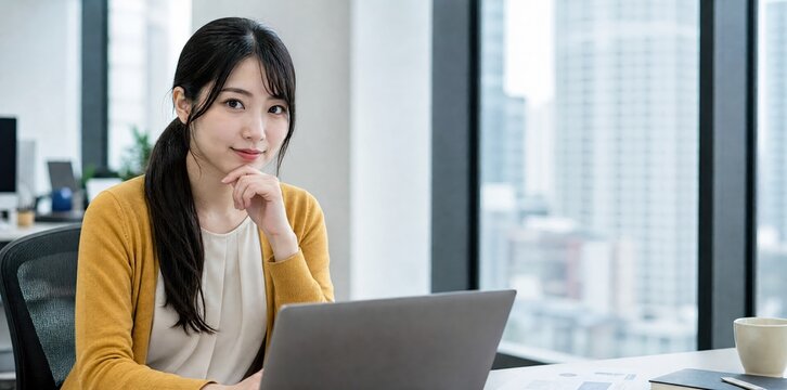 Generative AI, Thoughtful young Asian woman at laptop with city view in bright office