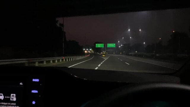 POV Driving on Highway at 4 AM.
Point of view (POV) dashcam footage of driving on an empty toll road highway at 4:00 AM.