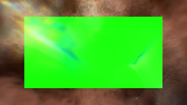 Abstract green screen rectangle floats within a dark textured tunnel frame to provide a versatile space for digital content integration and video production.
