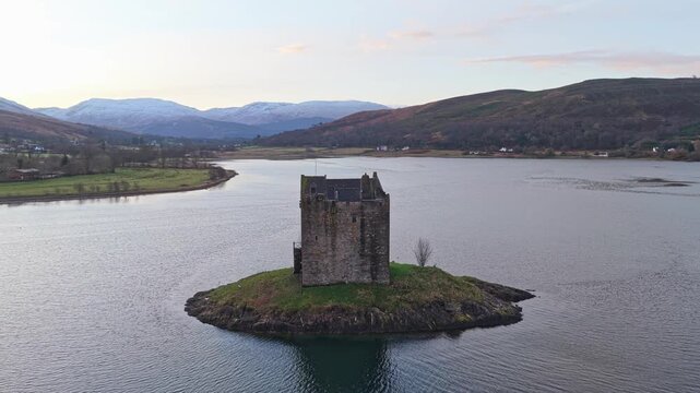 Castle stalker on loch laich in scotland during sunrise