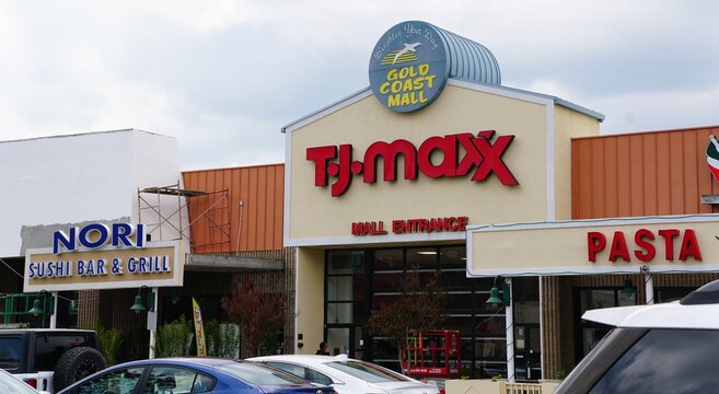 Ocean City, Maryland, U.S.A - May 23, 2026 - Gold Coast Mall featuring T.J.Maxx, Nori Sushi Bar and Grill, and adjacent storefronts with parked cars.