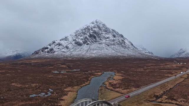 Scenic aerial view of river etive bridge and buachaille etive mor mountain