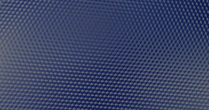 Blue Geometric Texture Seamless Rotation. Loop with subtle light reflections gliding across the surface.