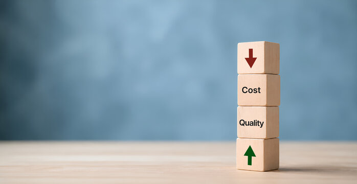 Cost Reduction and Quality Improvement concept. Wooden blocks showing cost down and quality up, symbolizing smart cost control, innovation and strategic improvement without sacrificing product value. 