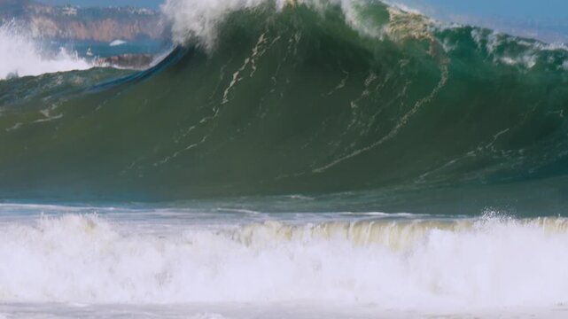 Giant waves breaking at The Wedge in Newport Beach California during large ocean swell