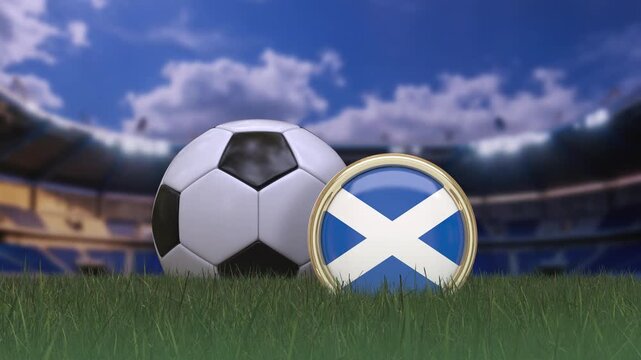 A football "soccer" ball rotating behind a badge displaying the Scotish flag on the grass of a playing field.  4K loopable video.