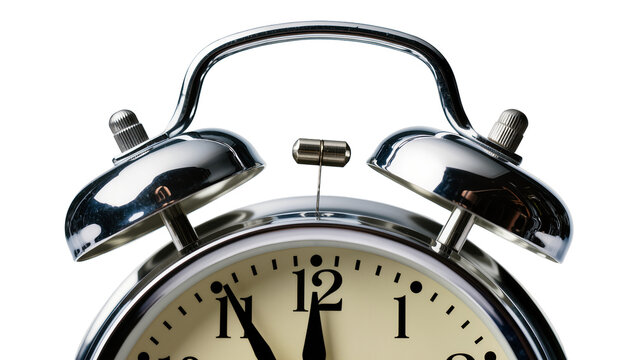 Isolated classic chrome alarm clock with twin bells and time close to midnight or noon
