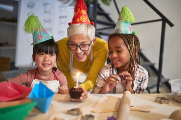happy kid having Birthday suprise on a creative workshop  Creative, hobby ,workshop  concept