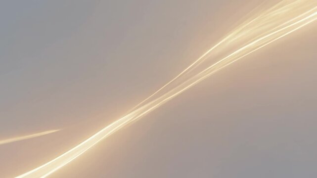 Dynamic golden light streaks moving across an abstract space