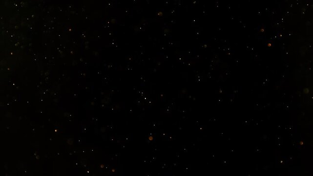 Flying Sparks Isolated on Black Background. Filmed on High Speed Cinema Camera