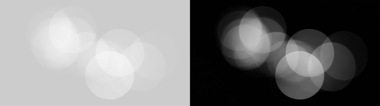 Bokeh light circles on black as sparkling particle effect overlay png