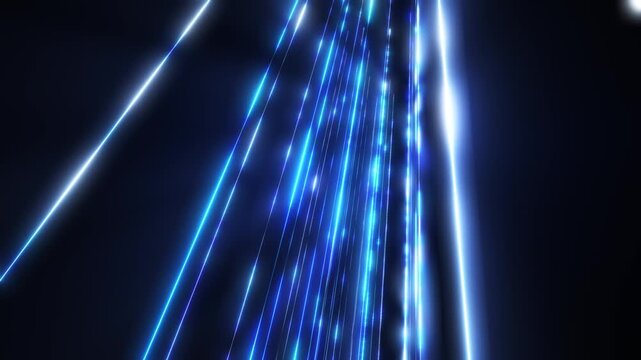 Blue glowing light beams and digital energy streams on a dark background. Futuristic technology motion with data transfer and speed effects.