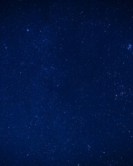 Vertical starry sky background blue space stars texture for social media © hannamartysheva