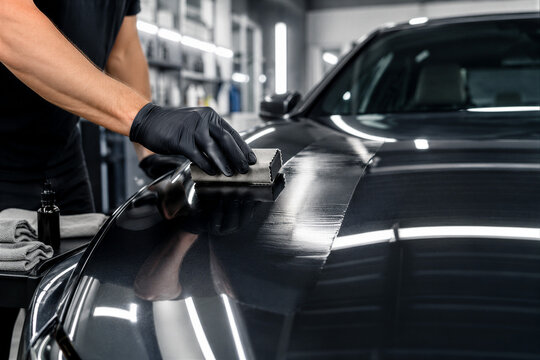 Professional Ceramic Coating Application on Luxury Vehicle Paint