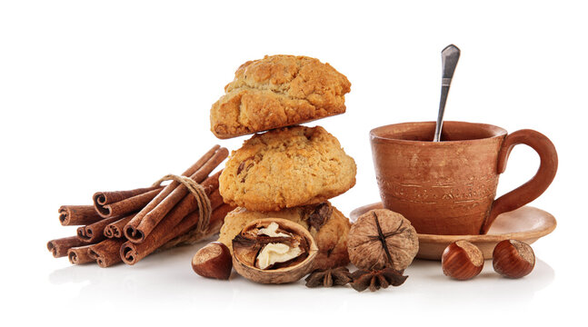 Homemade cookie with coffee and spice. Still life with sweetness baking and hot drink. Isolated on white background.