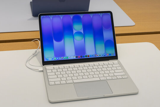 MacBook Neo display at an Apple Store. MacBook Neo is a budget Mac inexpensive laptop that runs on an iPhone processor.