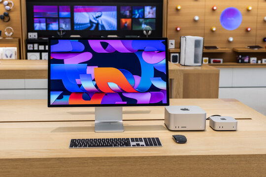 Mac Studio, Mac mini and Studio Display at an Apple Store. Mac mini is a value computer and the Mac Studio is a workstation.