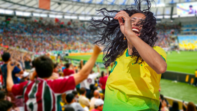 A passionate Brazilian soccer fan celebrates a goal in a stadium, wearing a yellow jersey. Her joyful expression and flying hair capture the intense excitement 
