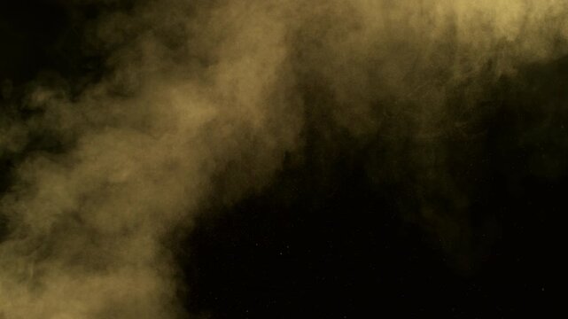 Super Slow Motion Shot of Flying Sand Powder , Isolated on Black Background , Filmed on High Speed Cinematic Camera at 1000 FPS