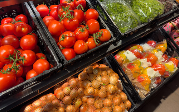 fresh organic vegetables on the shelf in the supermarket
