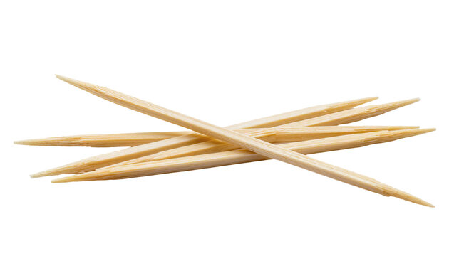 Isolated essential wooden toothpicks for oral hygiene, culinary needs, and art projects