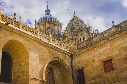 Salamanca cathedral dome and rooftops with blue sky