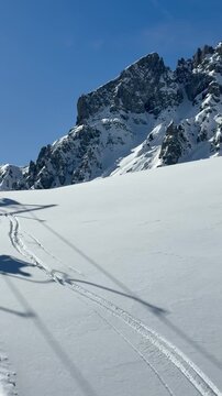 Chairlift ride through Dolomiti Superski with breathtaking alpine views all around. Snow-covered peaks, endless mountain scenery and the peaceful atmosphere of the Italian Dolomites