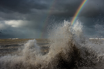 Naklejka premium Powerful Storm Waves and Rainbow During Cyclogenesis in Mar del Plata, Argentina