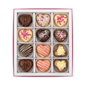 A square box containing twelve assorted heart-shaped chocolates, featuring dark, milk, and white chocolate coatings with pink sprinkles, drizzled stripes, and cream swirls