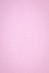 Fototapeta premium Light pink fabric serves as a solid backdrop for various design projects and crafts during the day