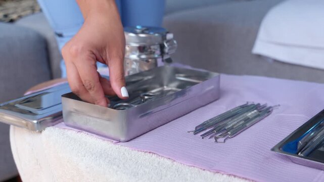 Podiatrist preparing sterilized medical instruments for treatment
