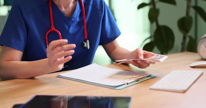 Disappointed doctor throws ultrasound images and gestures over desk. Woman physician diagnoses dangerous disease by patient test results in clinic