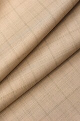 Grid check pattern defines this elegant beige cashmere suiting fabric, perfect for luxury menswear fashion, tailoring textile backgrounds, and high-end bespoke apparel design texture.