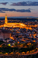 Obraz premium Spain. Toledo with Alcazar castle at sunset, Castilla-La Mancha. Summer tourism and travel