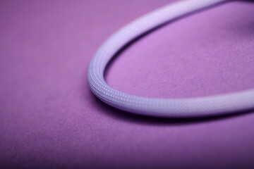 Obraz premium Macro photograph of a purple cable for data and power transfer