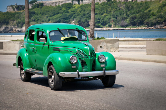 Green vintage car in Havana